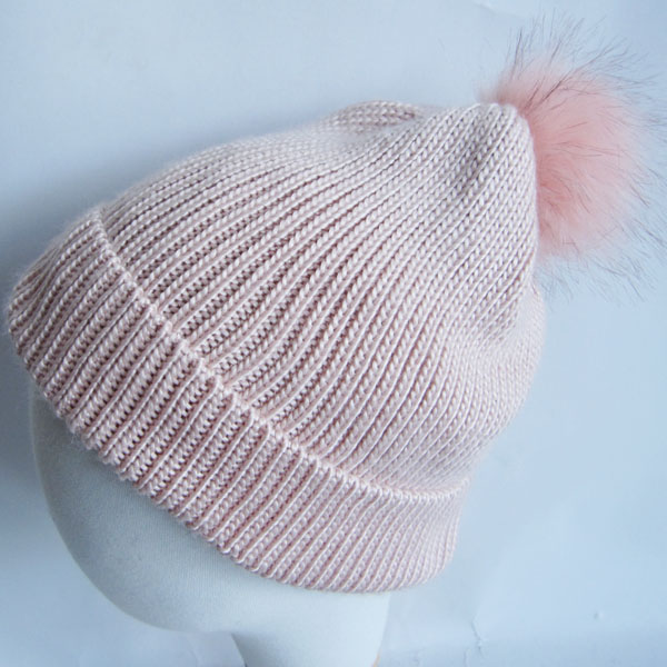 pink acrylic hat with fake fur pompom