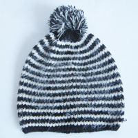 feather yarn hat with pompom